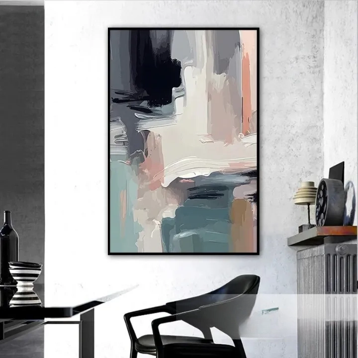 a modern art piece hanging on a white wall in a minimalist setting.