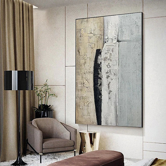 a living room with a large painting on the wall