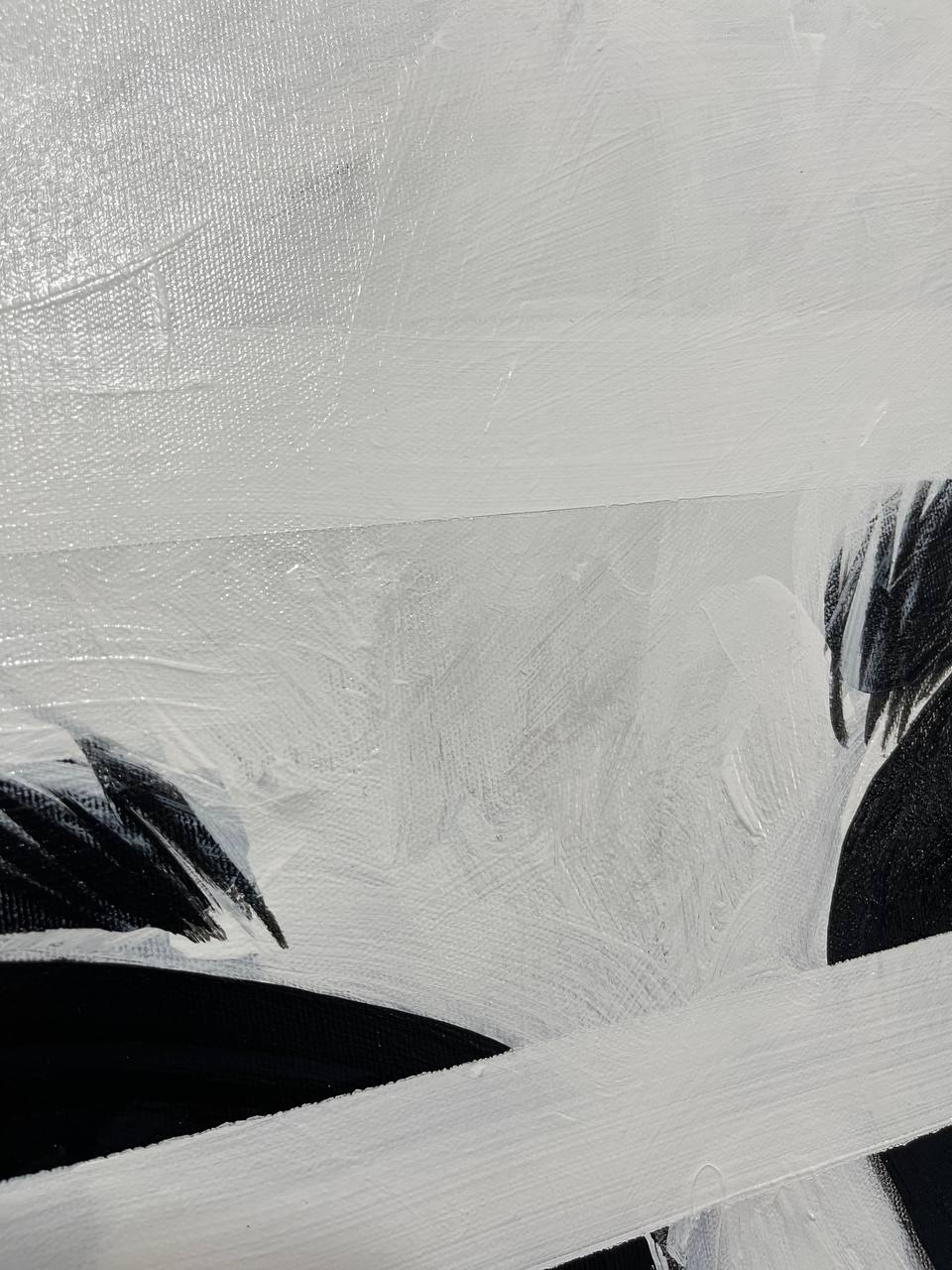 a painting with black and white paint on it