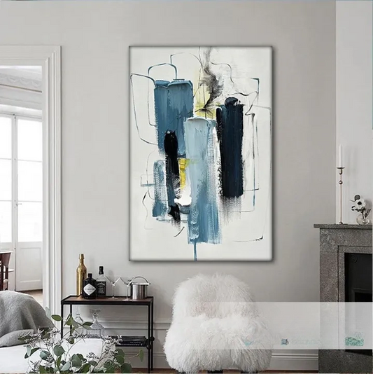 a modern abstract painting hanging on a wall in a living room.