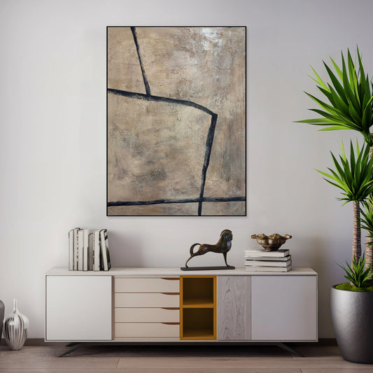 a modern living room with a white console table, a large abstract painting on the wall, and a potted plant.