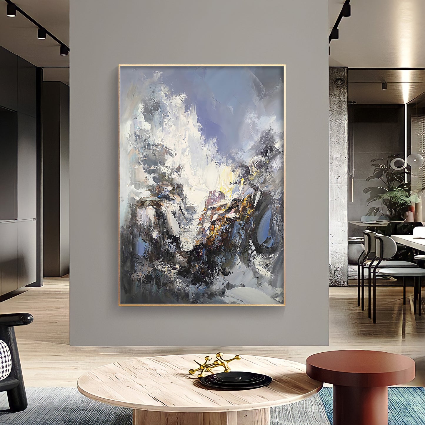 a painting hanging on a wall in a living room