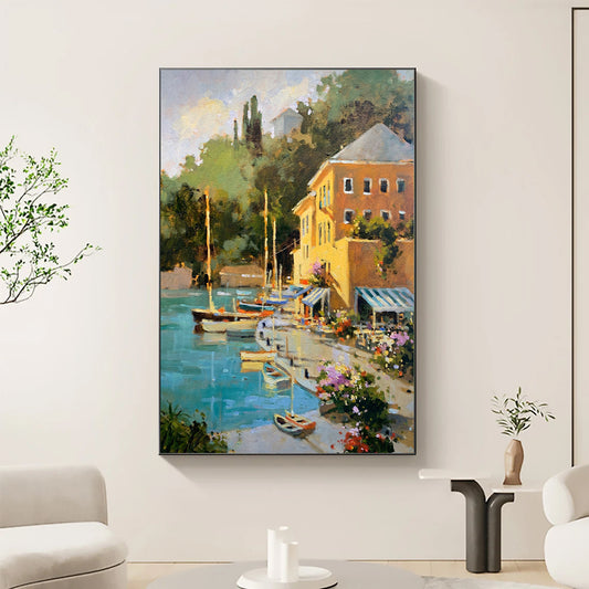 a living room with a painting of boats in the water