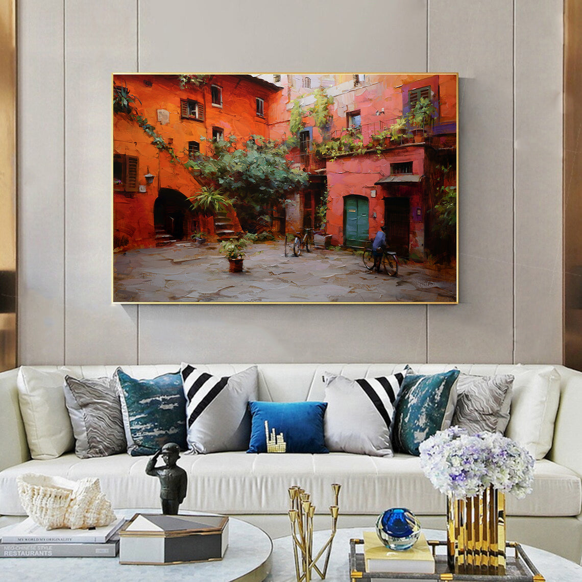 a living room filled with furniture and a painting on the wall