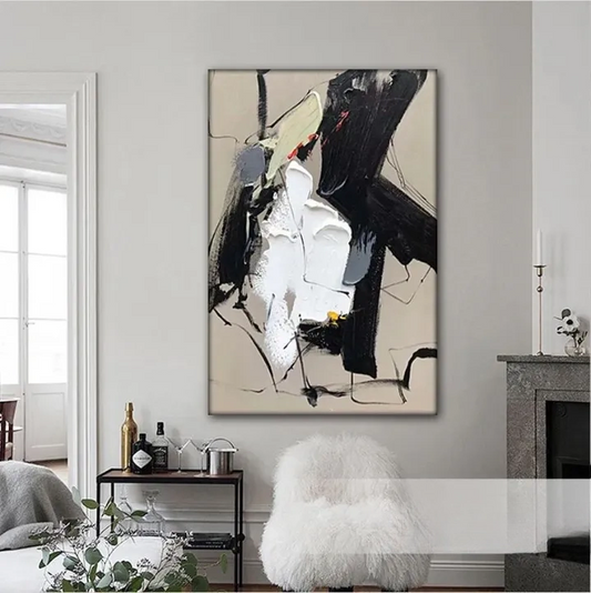 a large abstract painting hanging on a wall in a living room.