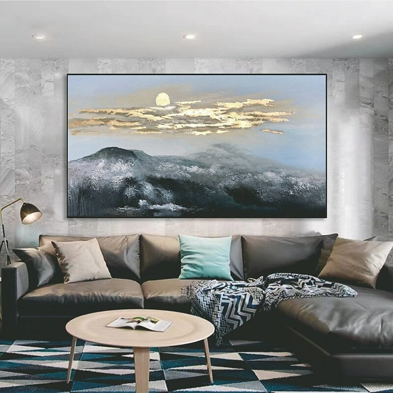 a living room filled with furniture and a painting on the wall