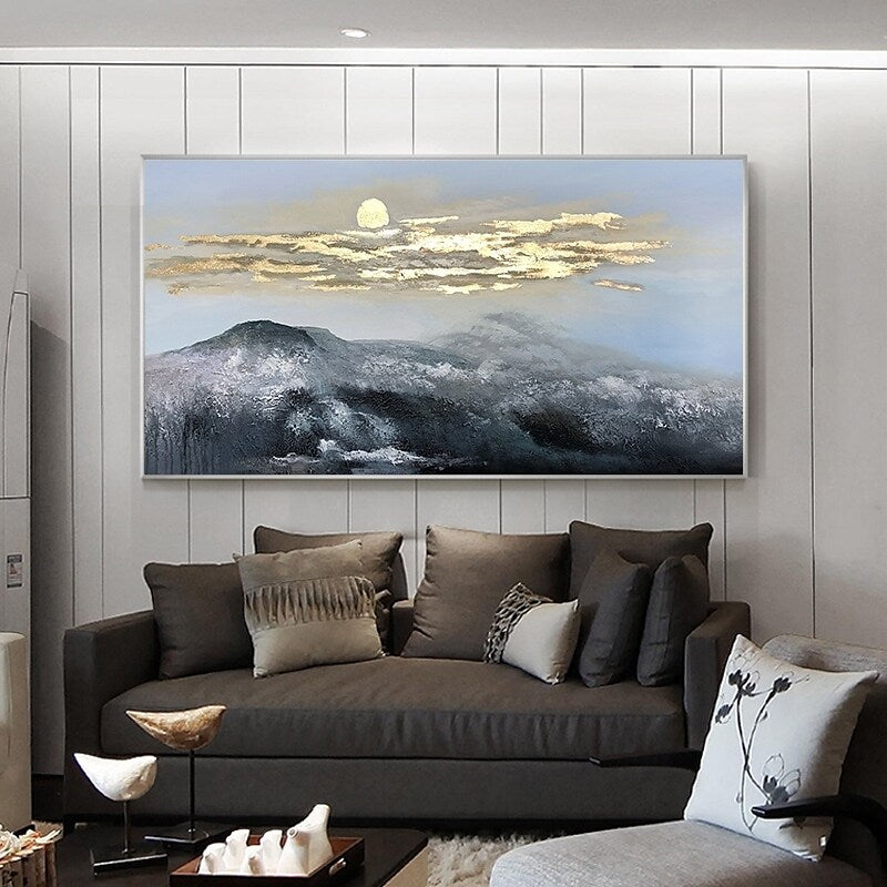 a living room filled with furniture and a painting on the wall