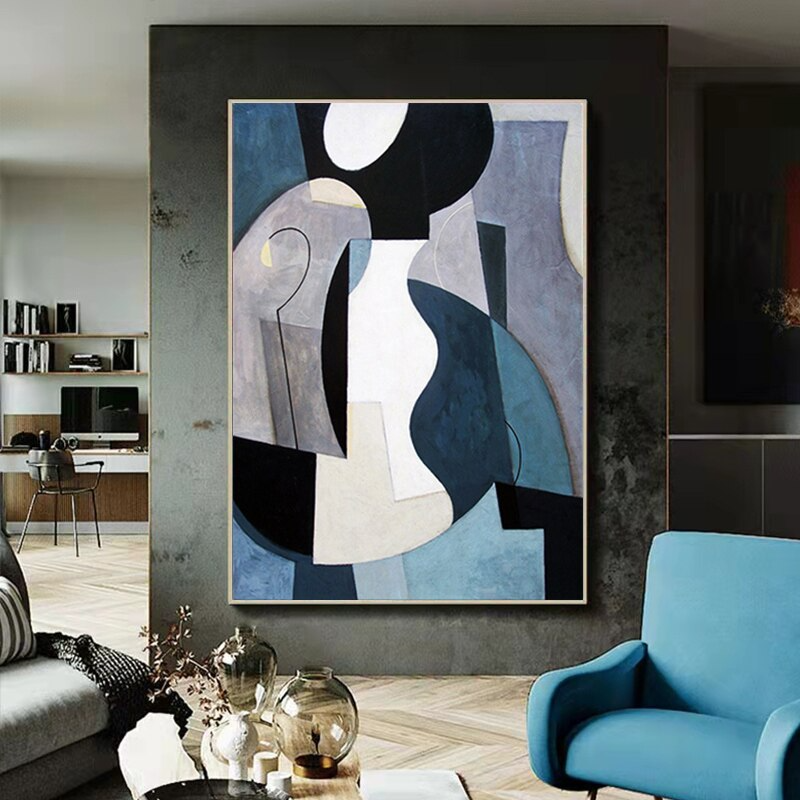 a living room filled with furniture and a painting on the wall