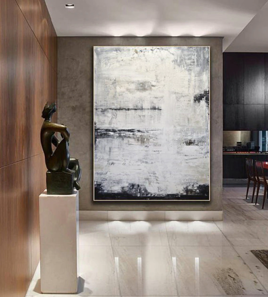 a large painting hanging on the wall of a dining room