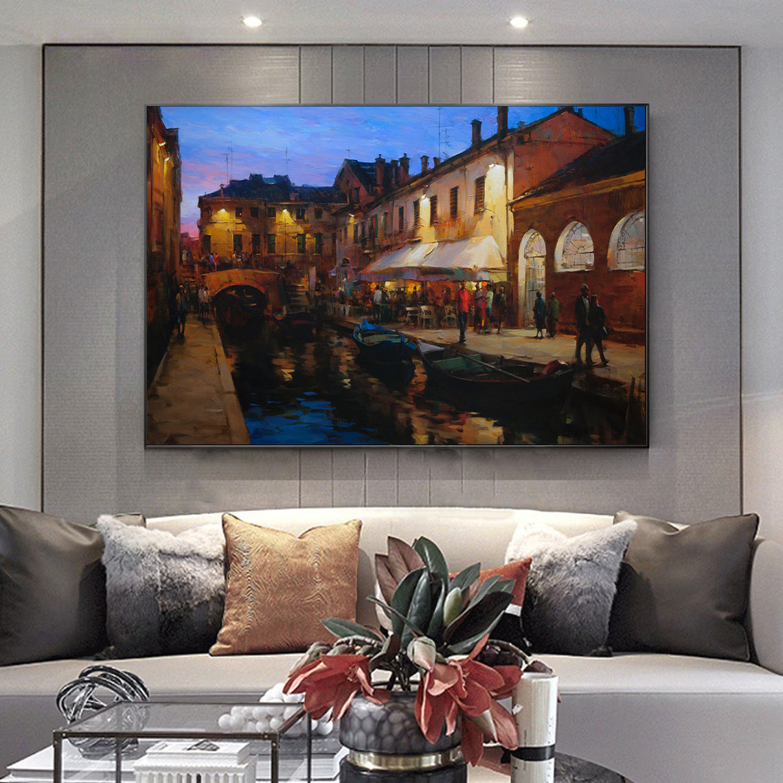 a living room with a couch and a painting on the wall