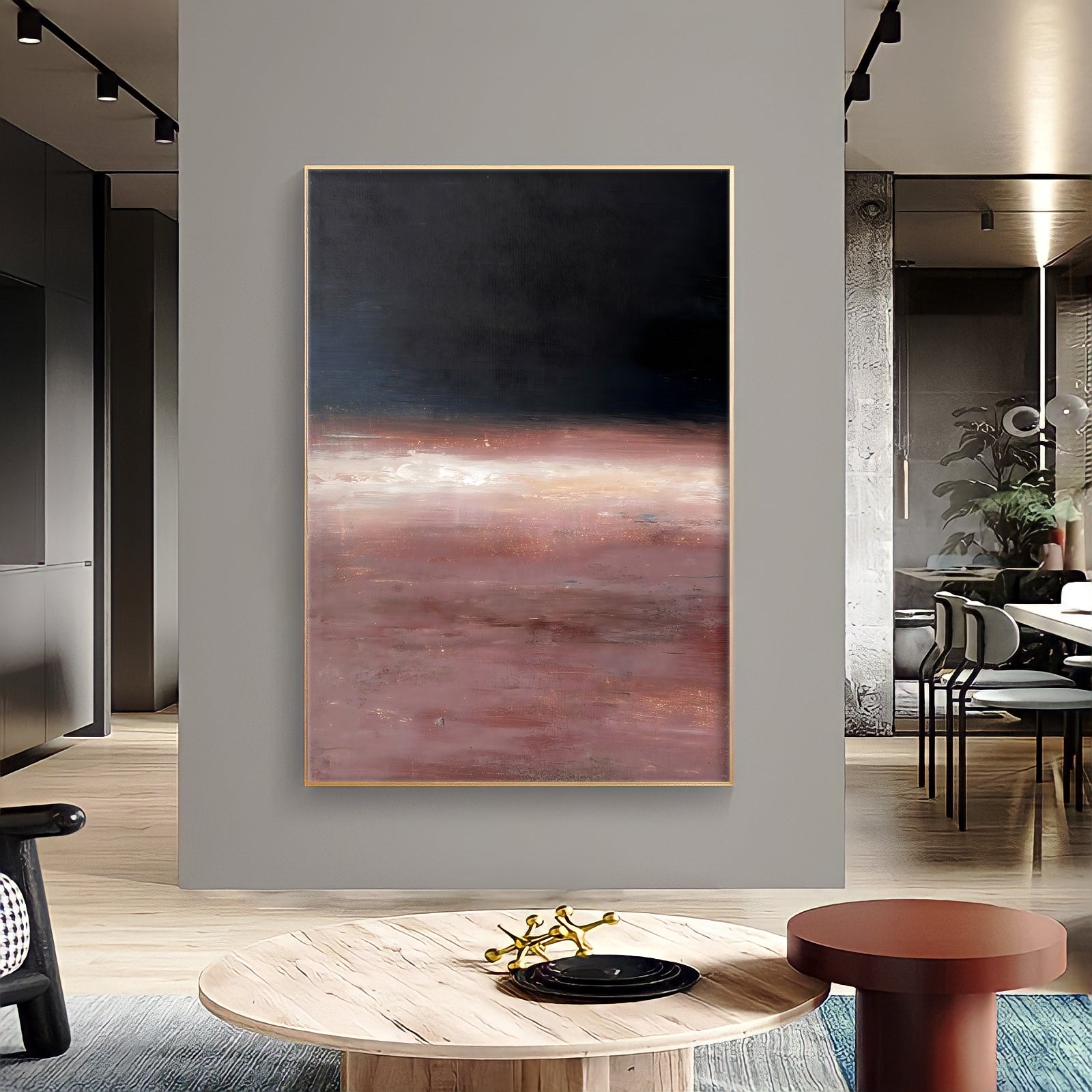 a living room with a large painting on the wall