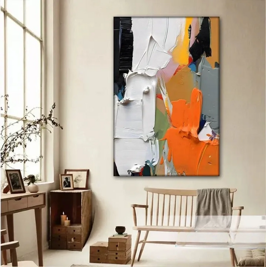 a large abstract painting hanging on a wall in a room with a wooden bench and other furniture.