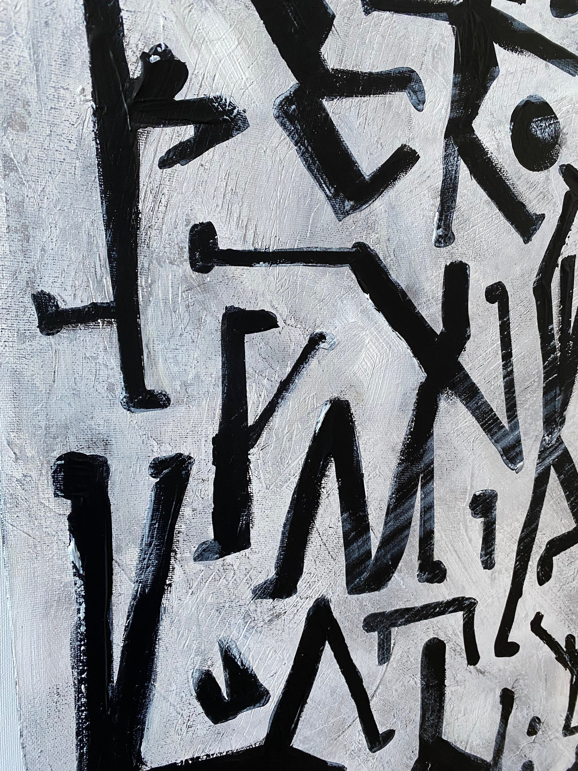 a painting of black and white letters and numbers