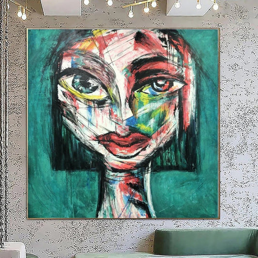 a large, colorful abstract painting of a face on a wall.