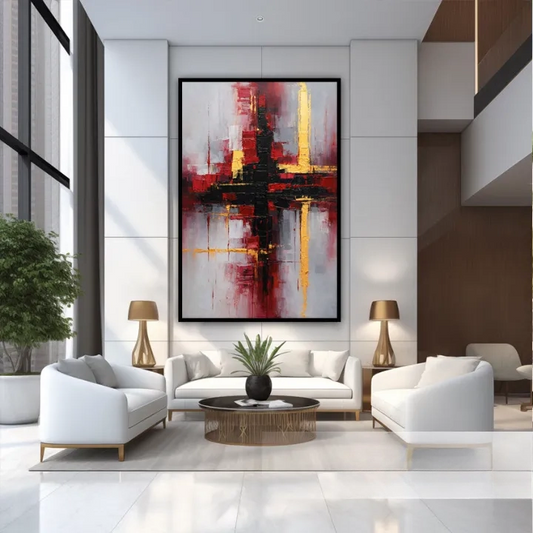 a modern living room with a large abstract painting hanging on the wall above a white sofa and two white armchairs. The room has a clean, minimalist design with white walls, a tiled floor, and gold accents.