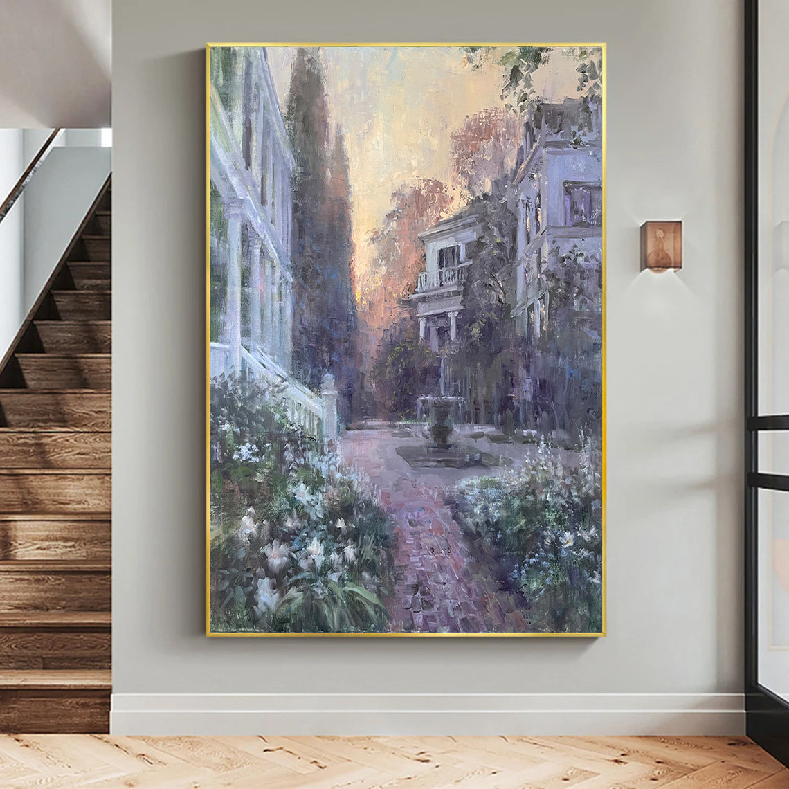 a painting hanging on a wall next to a stair case