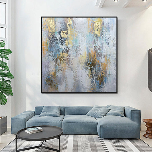 a living room with a large painting on the wall