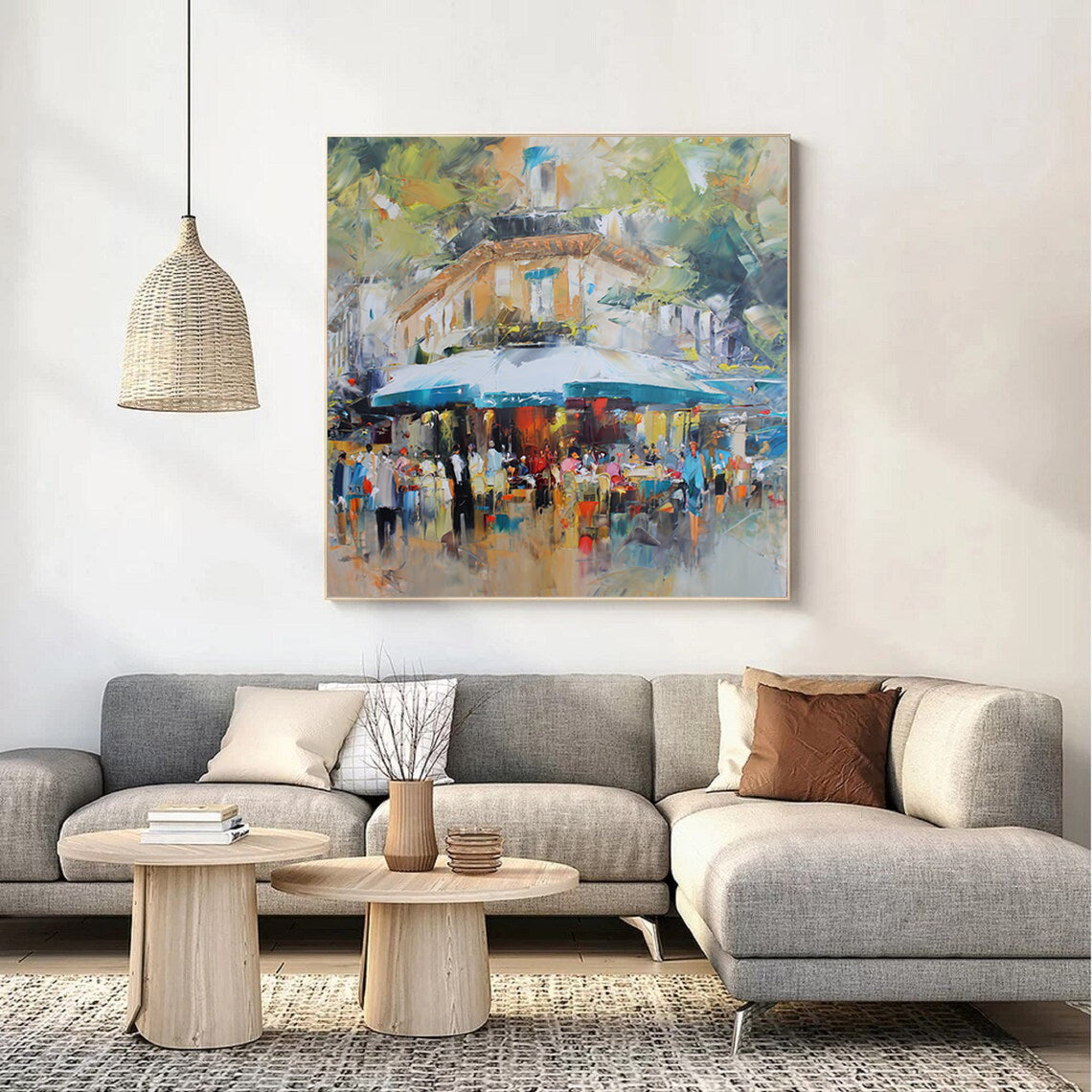 a living room with a large painting on the wall