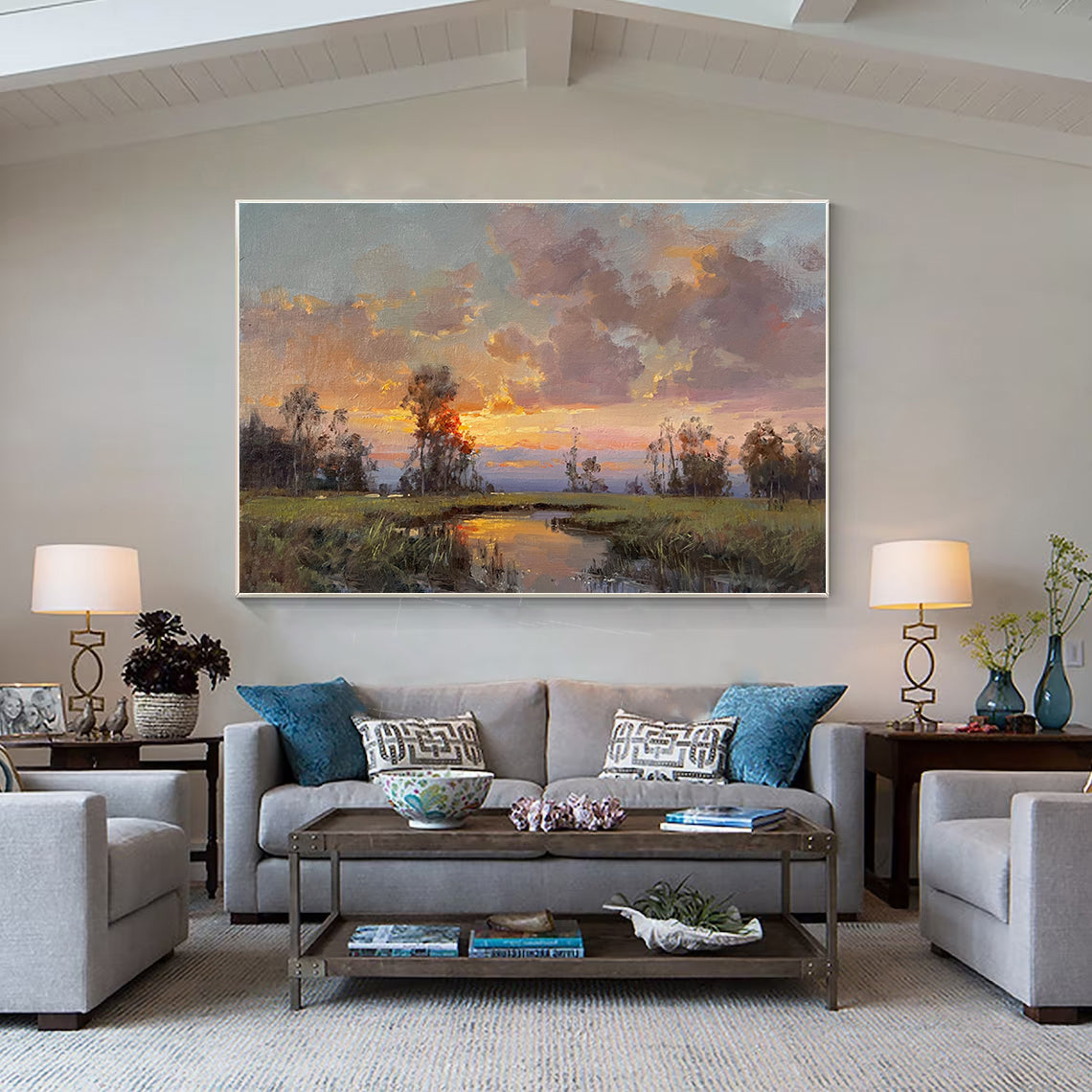 a living room filled with furniture and a painting on the wall