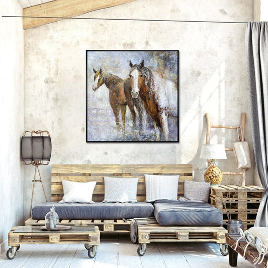 a living room with a large painting of two horses on the wall. The room has a rustic, industrial-style decor with wooden pallets, a wooden coffee table, and a wooden chair.