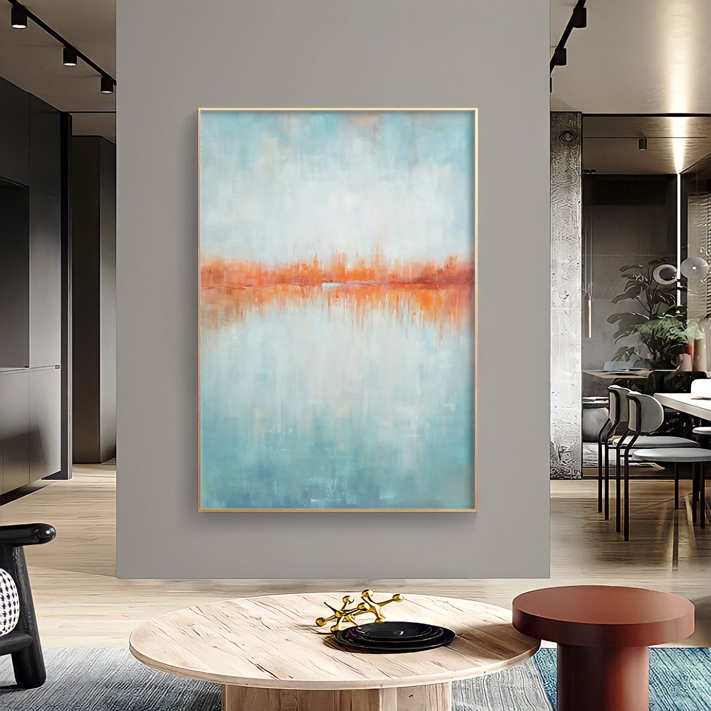 a painting hanging on a wall in a living room