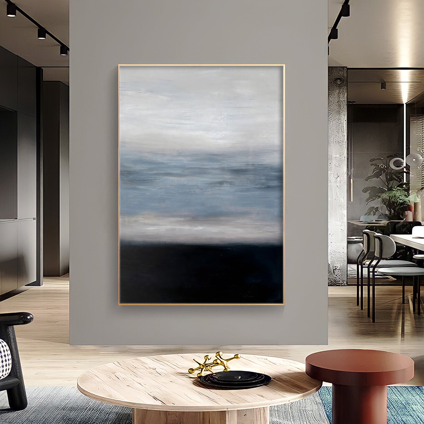 a living room with a large painting on the wall