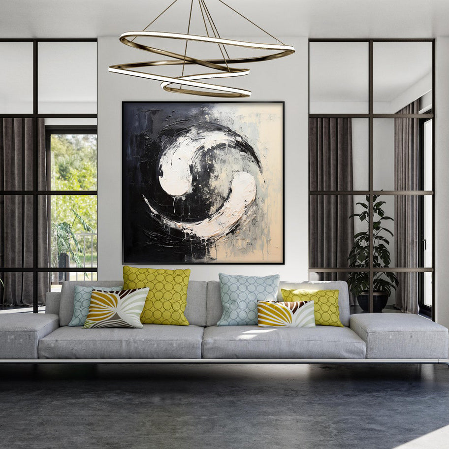 a living room filled with furniture and a painting on the wall