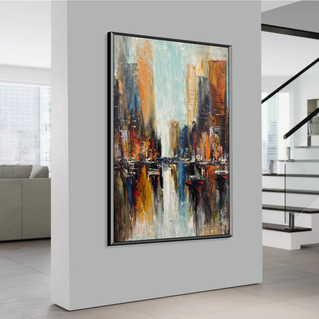 a large, colorful painting of a cityscape hanging on a wall in a modern, minimalist interior space.