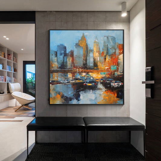 a painting of a cityscape is hanging on a wall