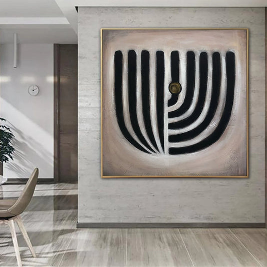 a modern art piece with a bold, abstract design on a wall.