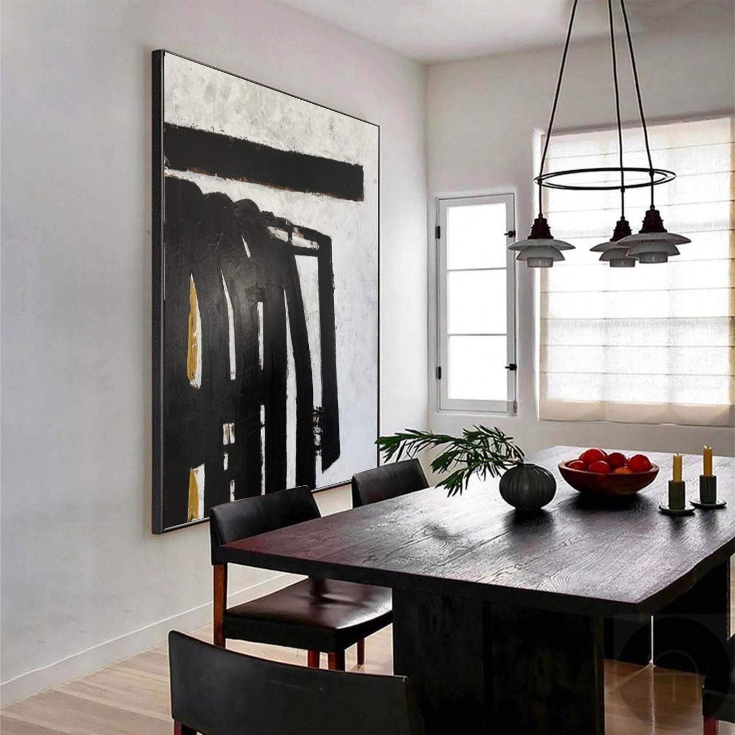 a dining room table with a bowl of fruit on it