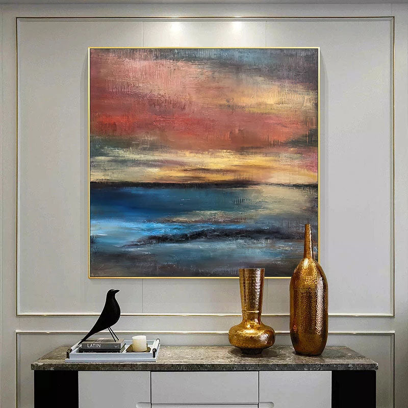 a painting on a wall above a table