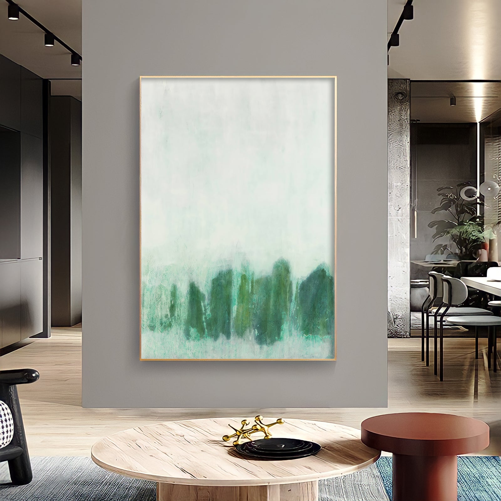 a painting hanging on a wall in a living room