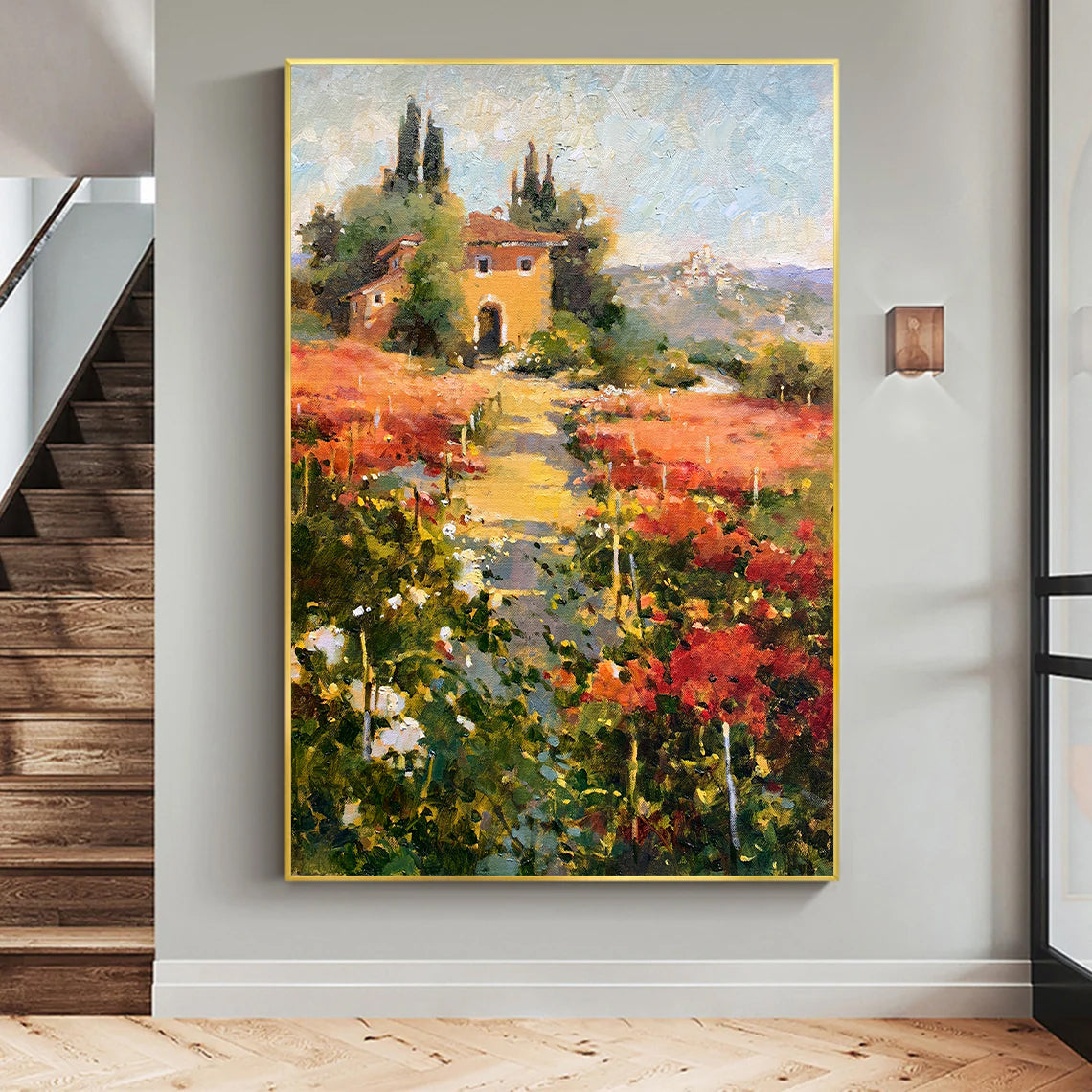 a painting hanging on a wall next to a stair case