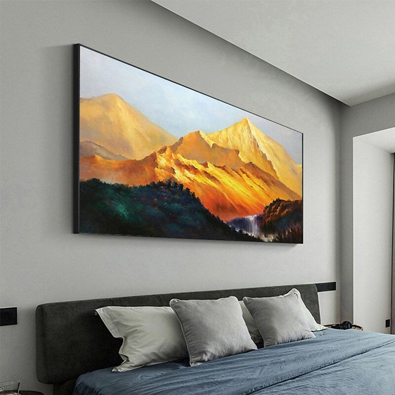 a painting hangs above a bed in a bedroom