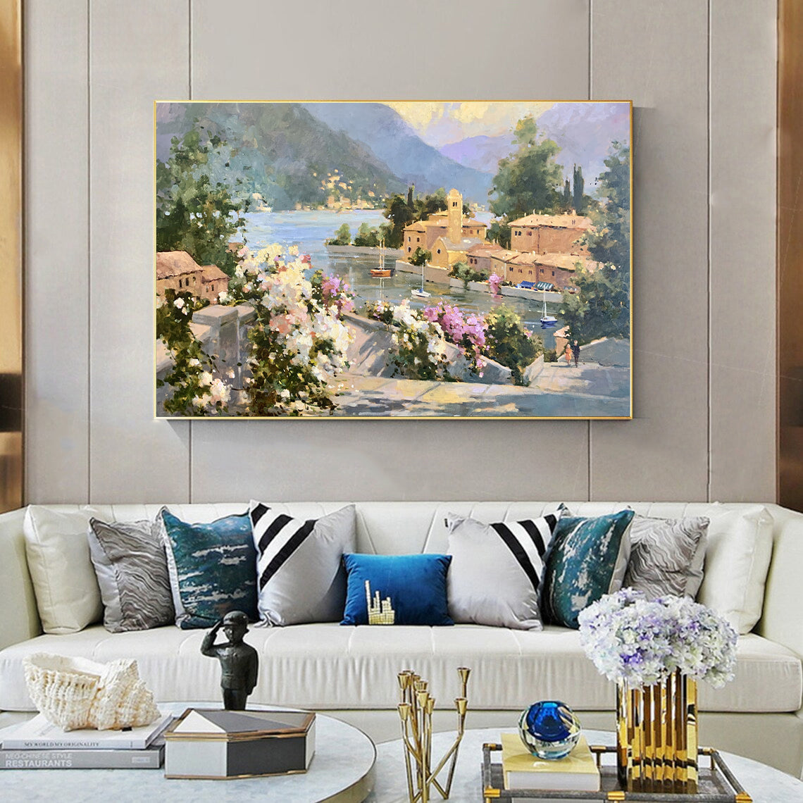 a living room filled with furniture and a painting on the wall