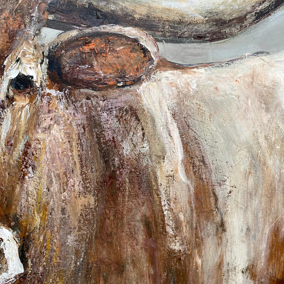 The image is a close-up of a painting depicting a cow's head, with a mix of brown, orange, and white colors.