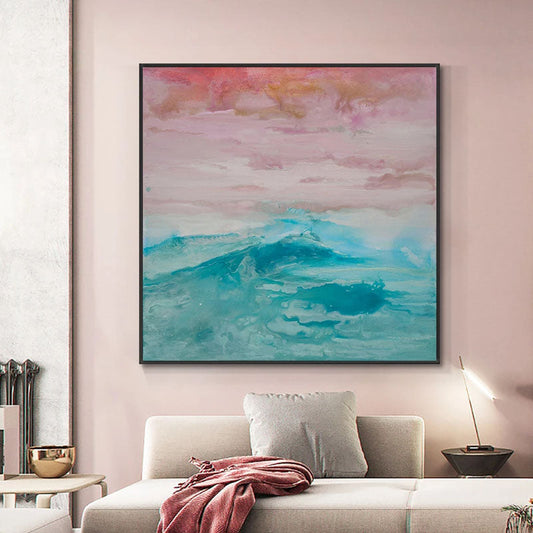 a living room with a couch and a painting on the wall