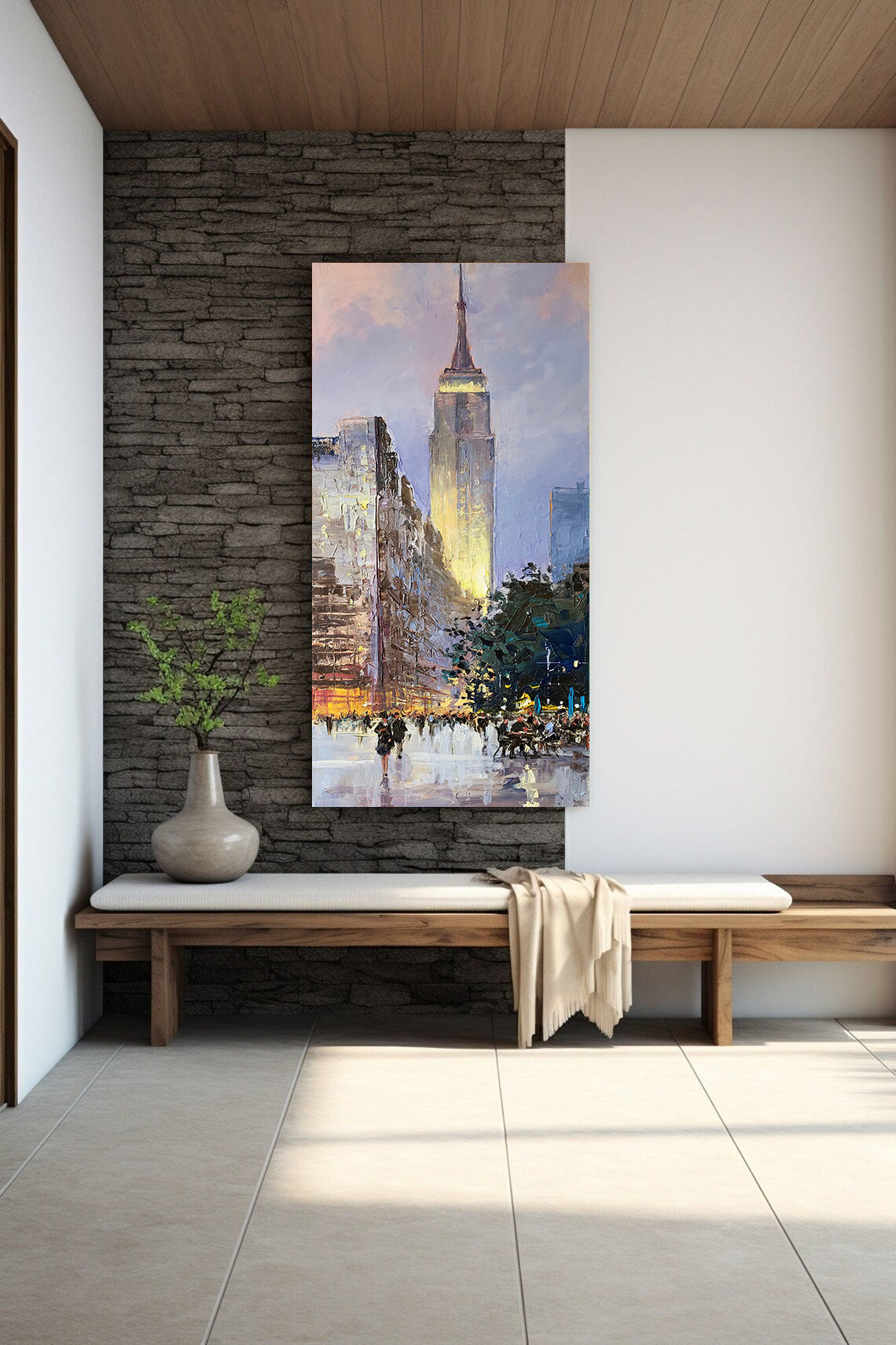 a painting of a cityscape on a wall above a bench