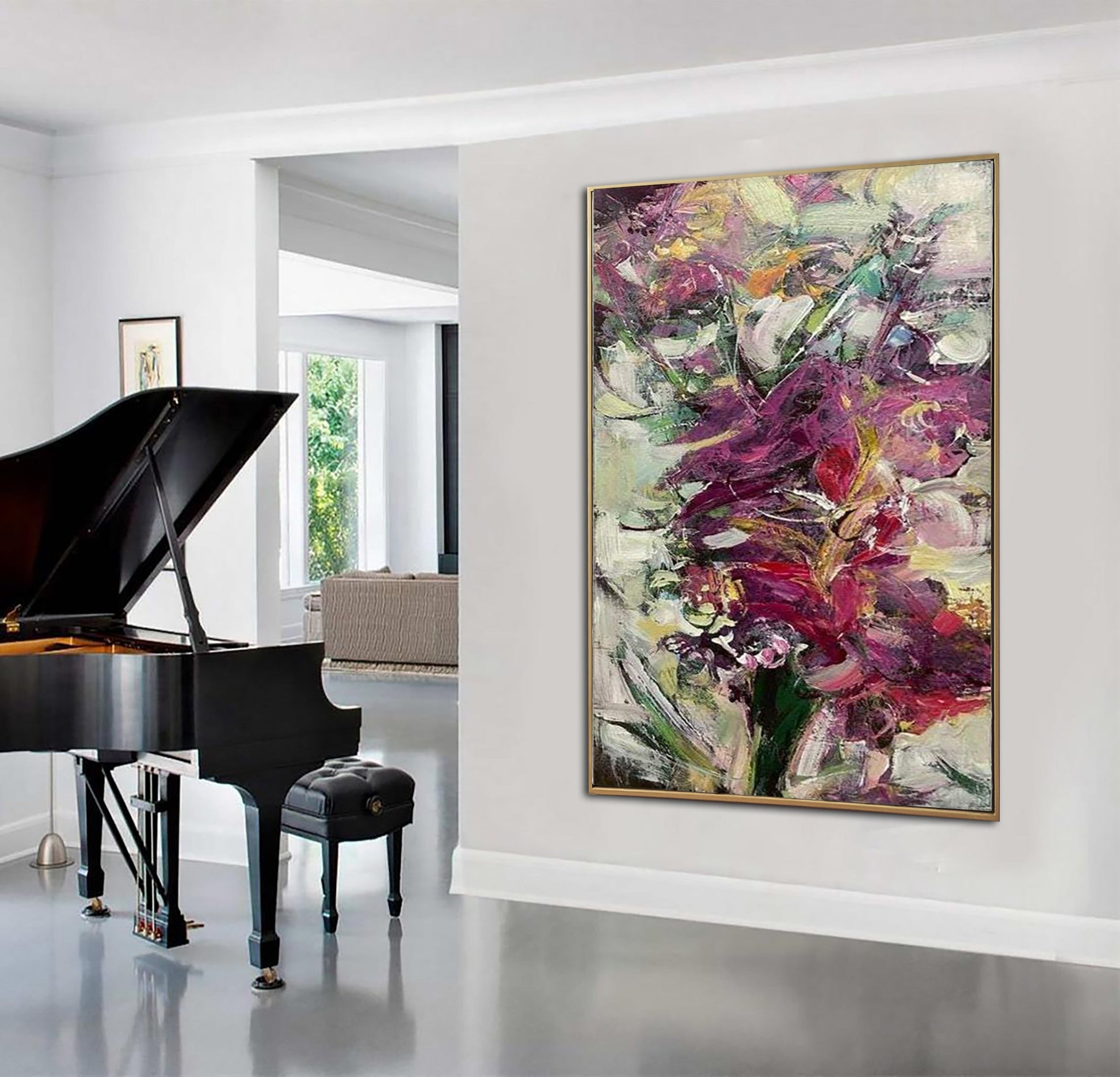 a piano and a painting in a room