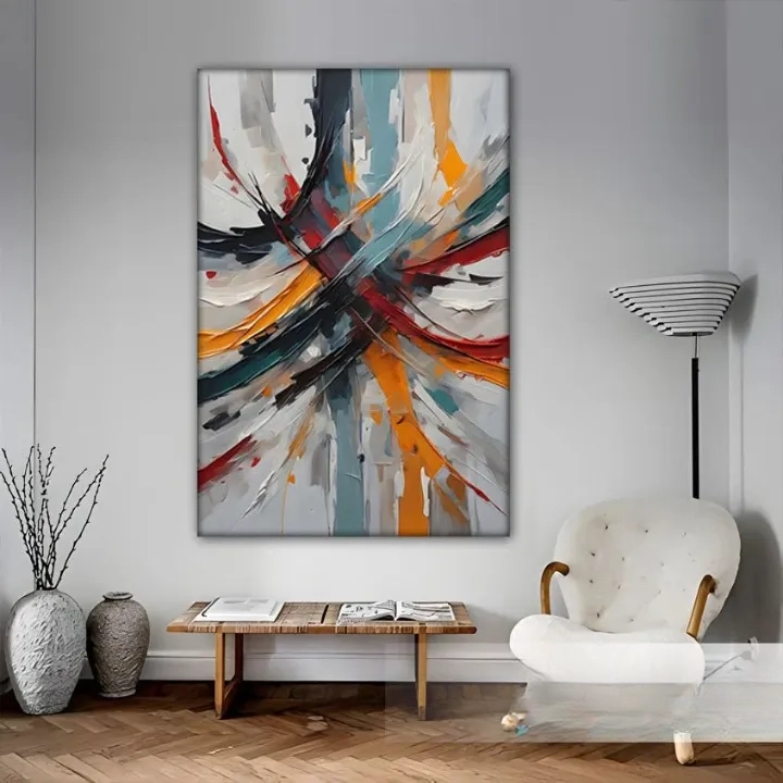 a large abstract painting hanging on a wall in a modern living room setting.