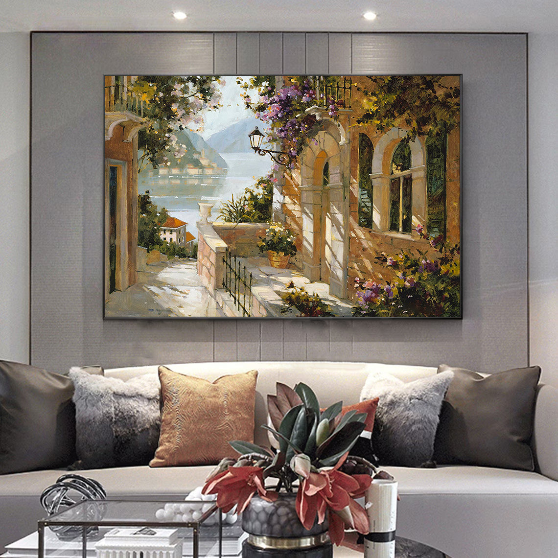 a living room with a couch and a painting on the wall