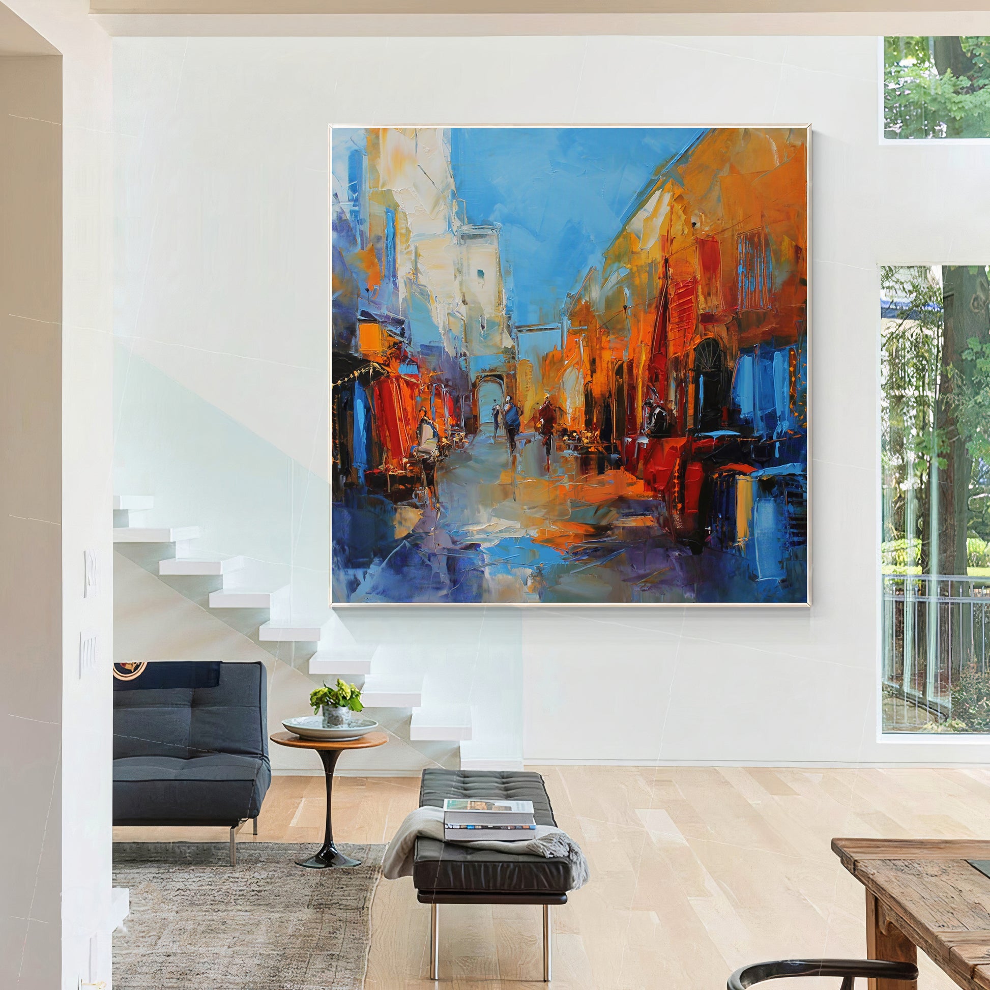 a painting hanging on a wall in a living room