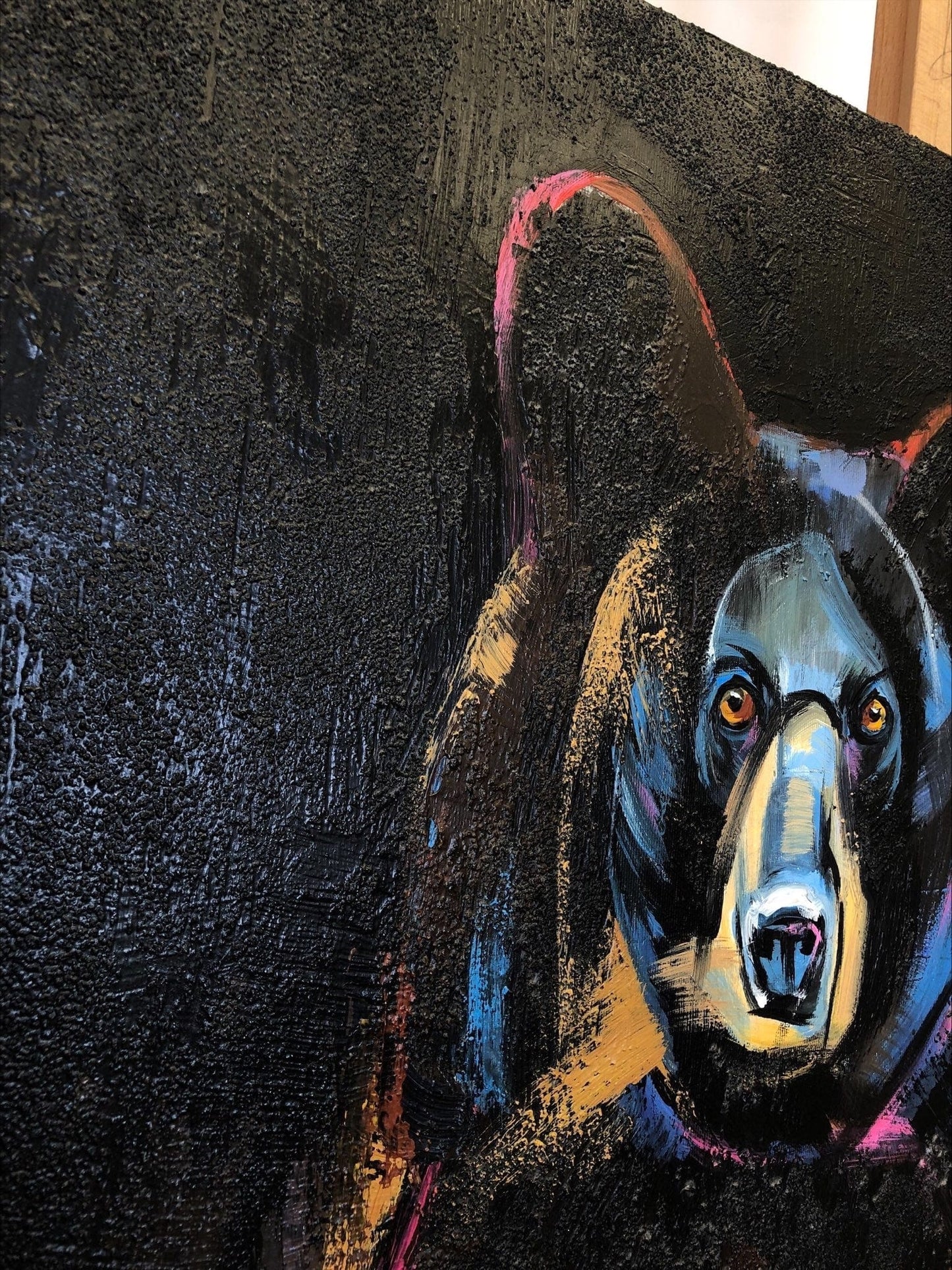 a painting of a bear on a wall