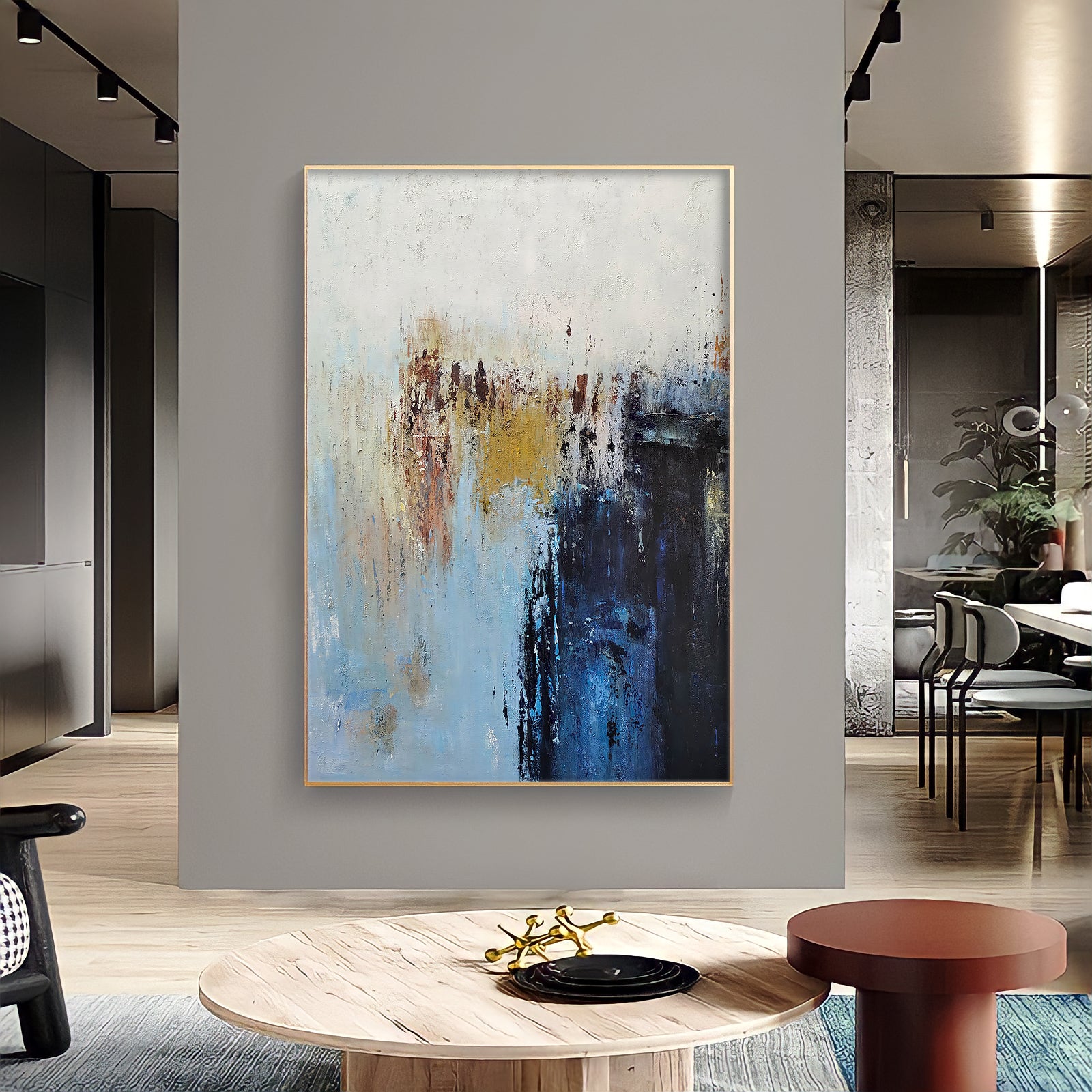 a painting hanging on a wall in a living room