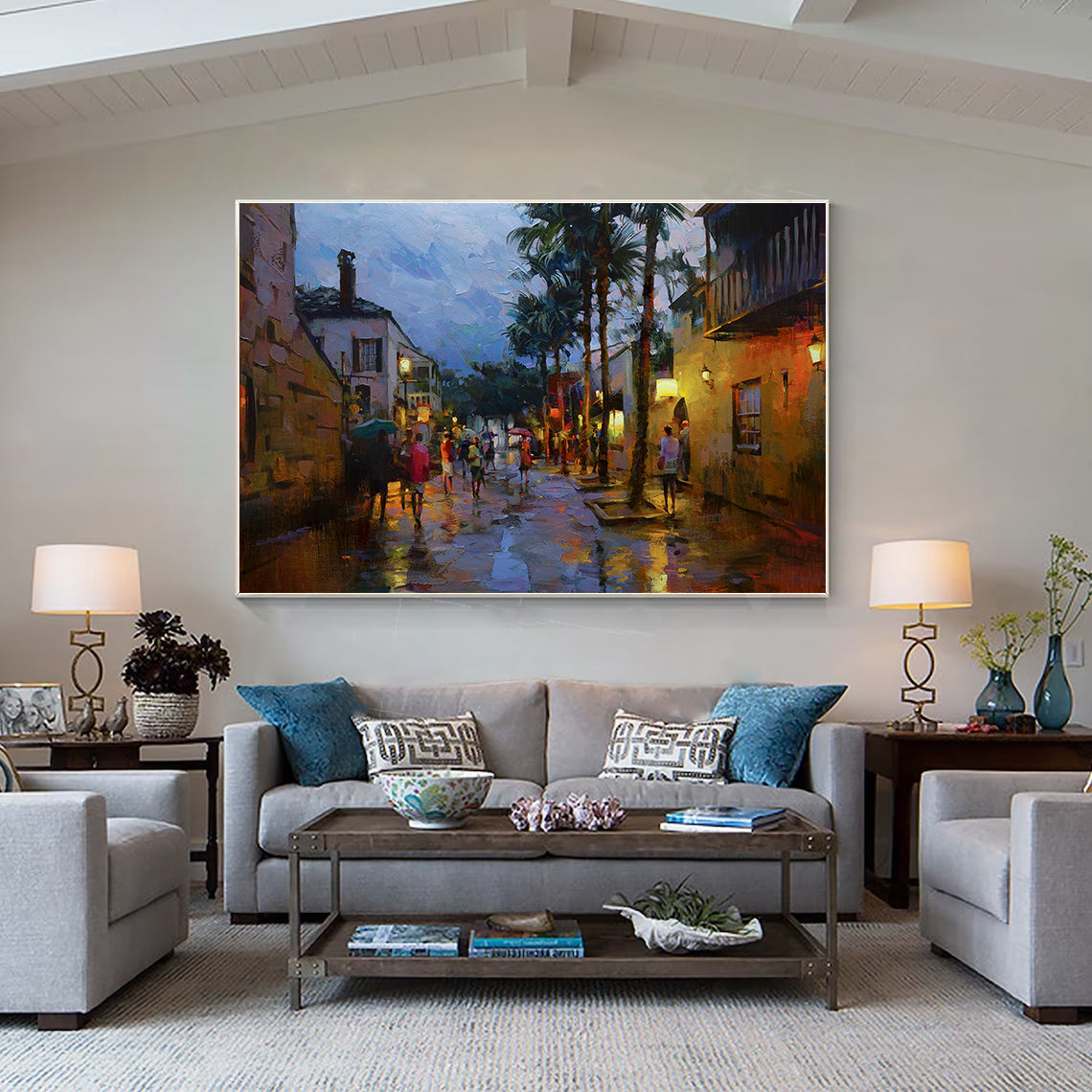 a living room filled with furniture and a painting on the wall