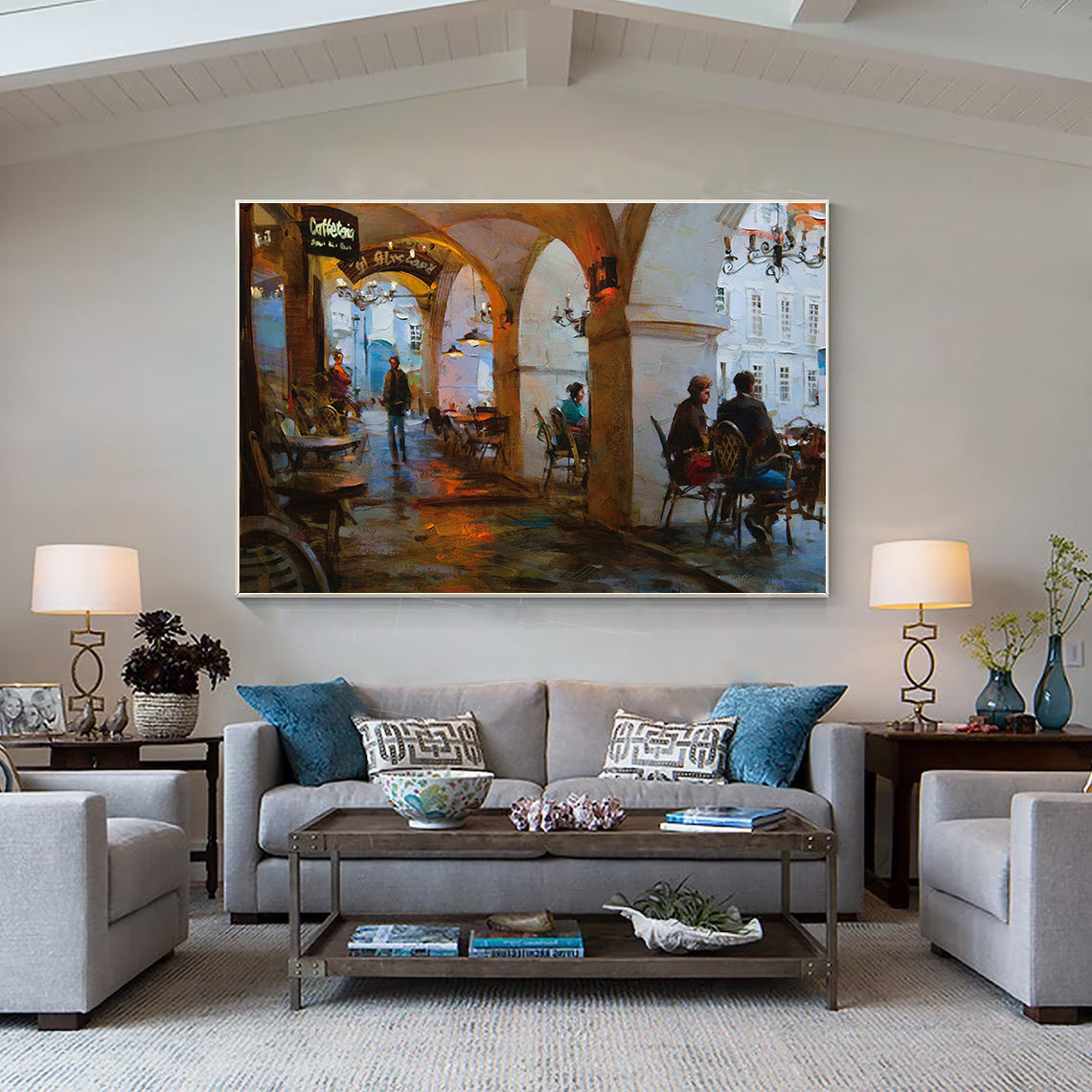 a living room filled with furniture and a painting on the wall