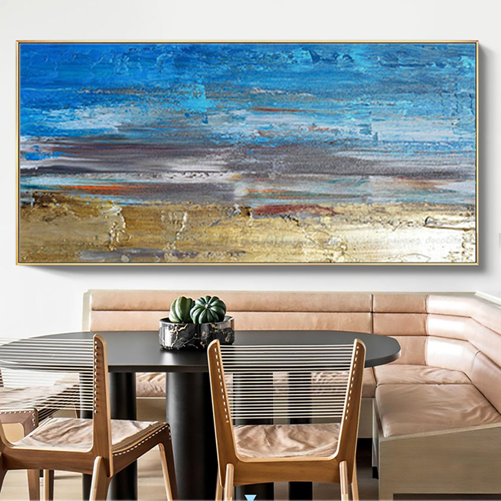 a painting hanging on a wall above a dining room table