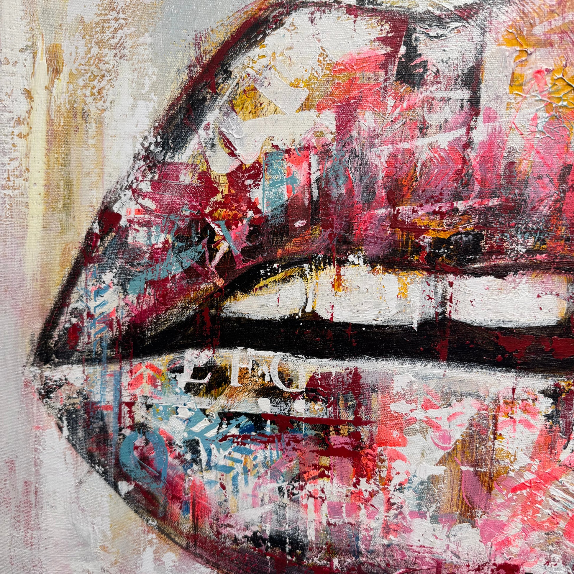 The image is a vibrant and colorful abstract painting featuring bold brushstrokes and a mix of red, pink, and blue colors.