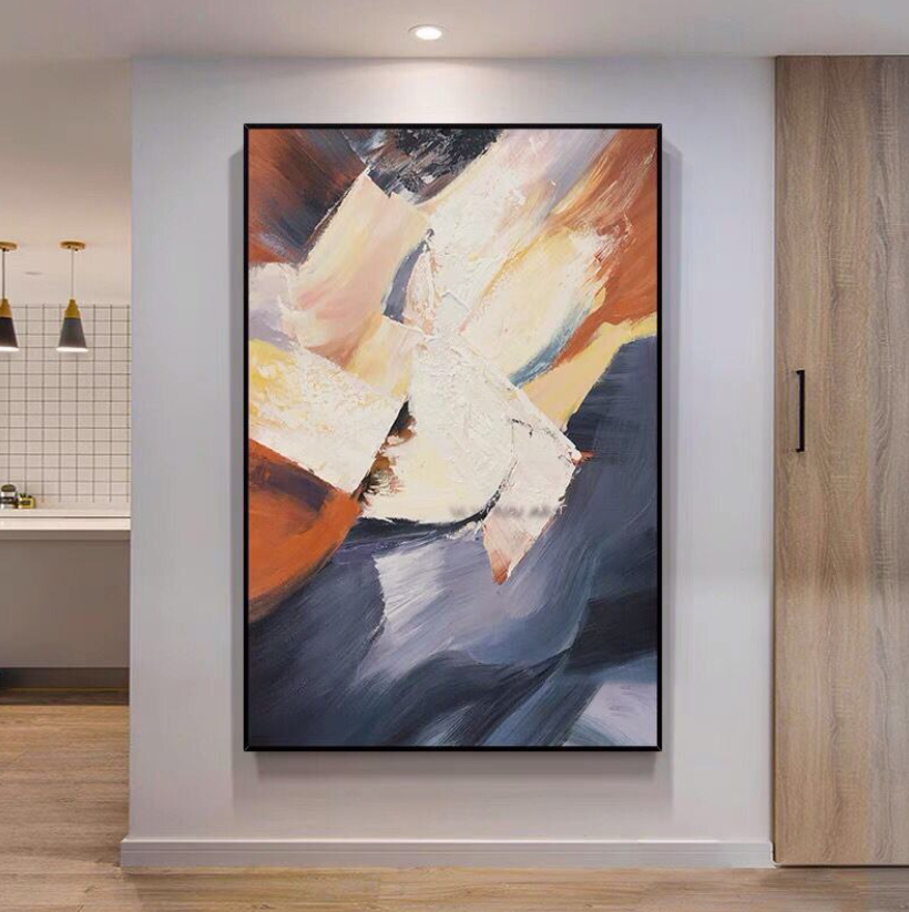 a painting hanging on a wall in a room